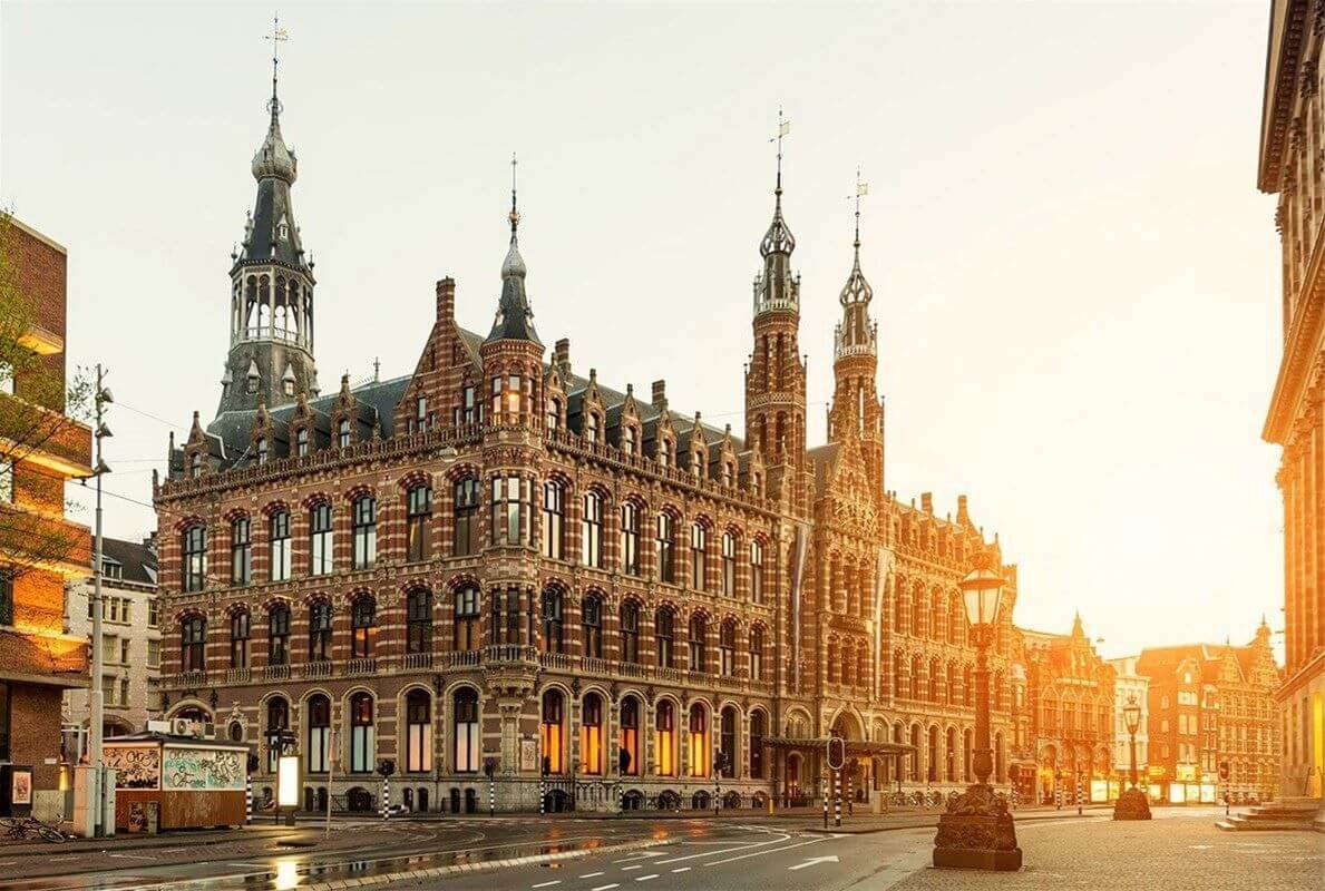 The historic neo-Gothic facade of Magna Plaza in central Amsterdam